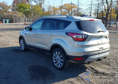 2017 Ford Escape Titanium from USA, damaged, VIN 1FMCU9J94HUB64676